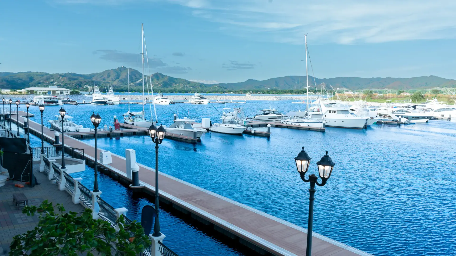 Flamingo marina with yachts and green hills in Guanacaste